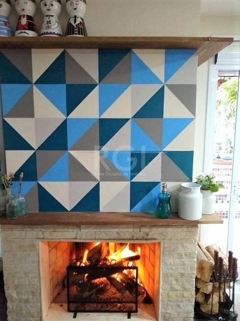Casa com 233m², 2 dormitórios sendo 1 suíte, living com lareira, espaço gourmet com churrasqueira, pátio e 2 vagas de garagem no bairro Sarandi — foto 3