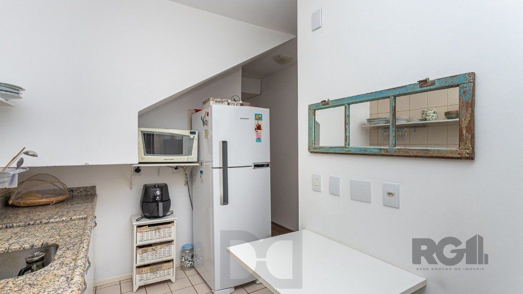 Casa em condomínio de 109m² - 3 dormitórios, 1 suíte e 1 vaga no bairro Teresópolis — foto 9