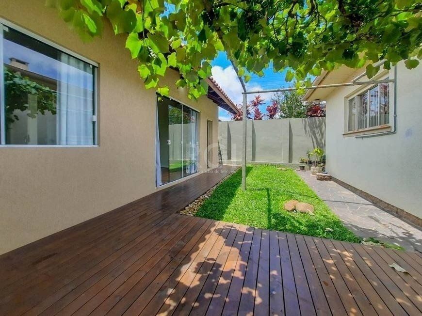 Excelente casa com 3 dormitórios e 3 vagas de garagem — foto 4