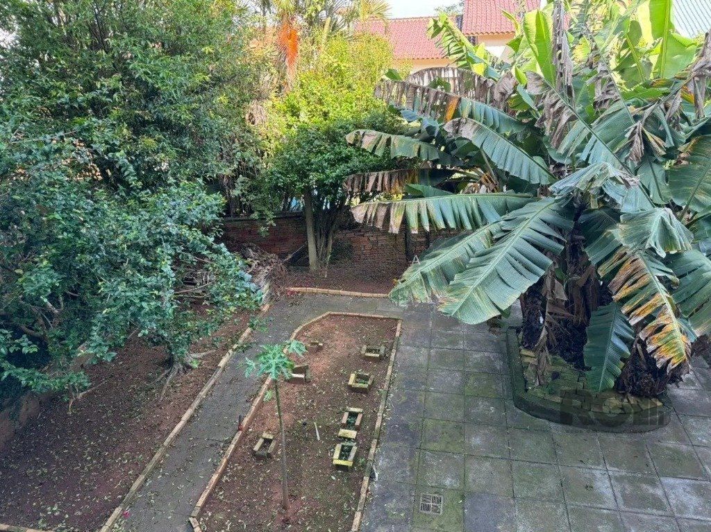 Casa com 4 dormitórios no bairro nonoai — foto 25