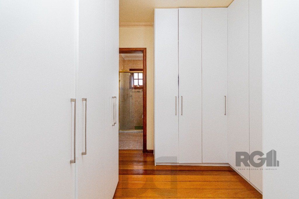 Casa de 4 dormitórios 304m² no bairro Jardim Lindóia — foto 34