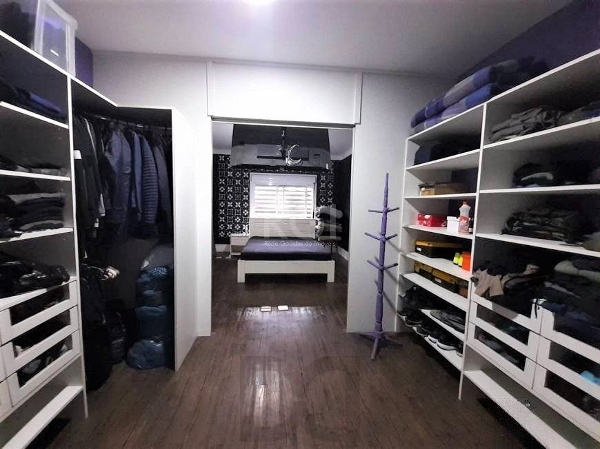 Casa com 233m², 2 dormitórios sendo 1 suíte, living com lareira, espaço gourmet com churrasqueira, pátio e 2 vagas de garagem no bairro Sarandi — foto 14
