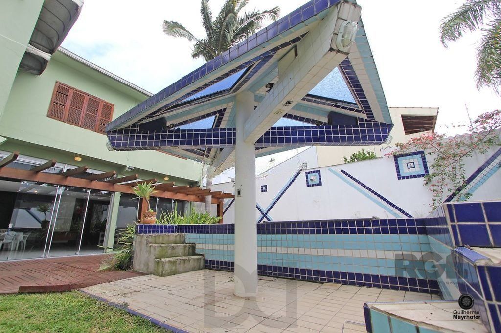 Casa com 5 suítes, 7 banheiros, 4 vagas no bairro Partenon — foto 52