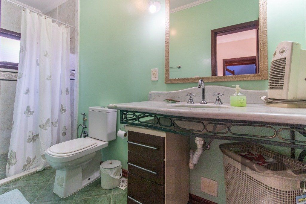 Linda casa de 04 dormitórios com vista livre no Bairro Teresópolis — foto 63
