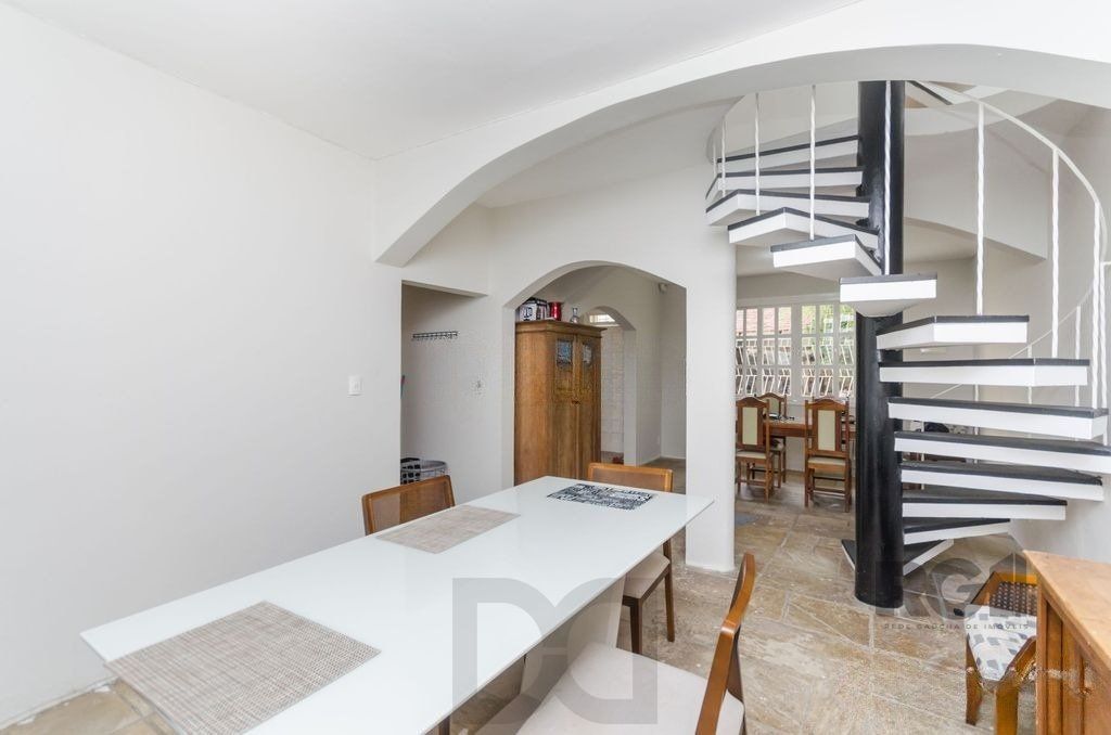 Casa de 4 dormitórios no bairro Três Figueiras — foto 4