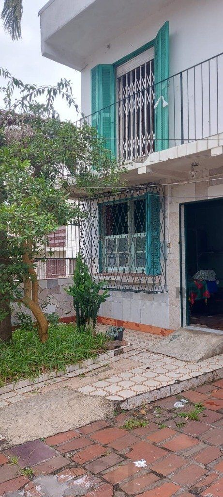Casa 3 dormitórios Bairro Nonoai — foto 1