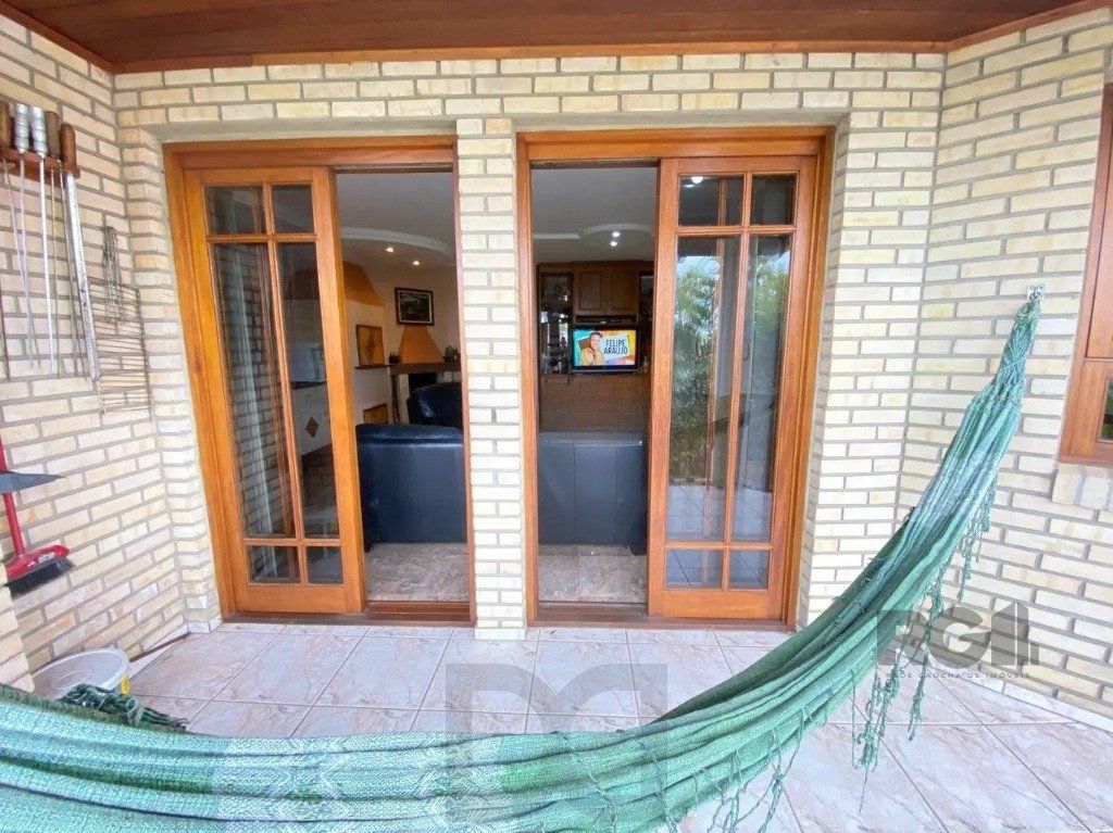 Casa com 4 dormitórios no bairro nonoai — foto 23