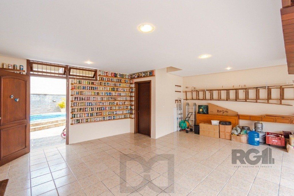 Casa com 4 dormitórios no bairro Morro Santana — foto 8