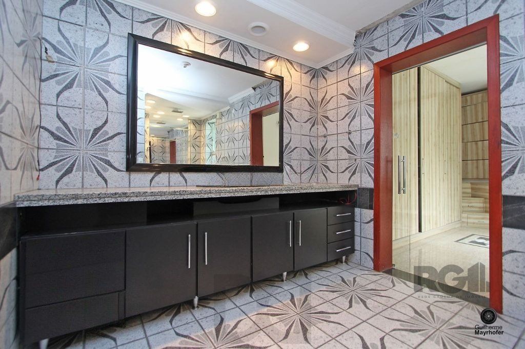 Casa com 5 suítes, 7 banheiros, 4 vagas no bairro Partenon — foto 27