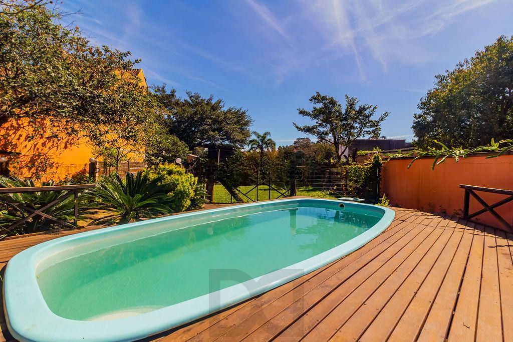 Casa de 3 dormitórios, no Bairro Ponta Grossa - Porto Alegre — foto 1