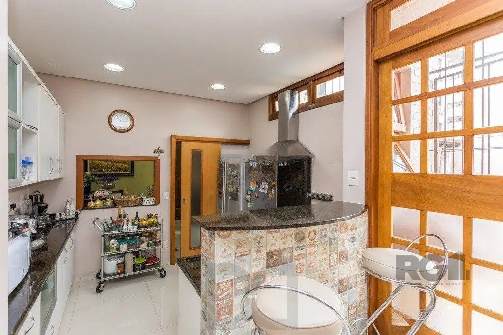 Casa com 3 dormitórios no bairro Jardim Lindóia — foto 26