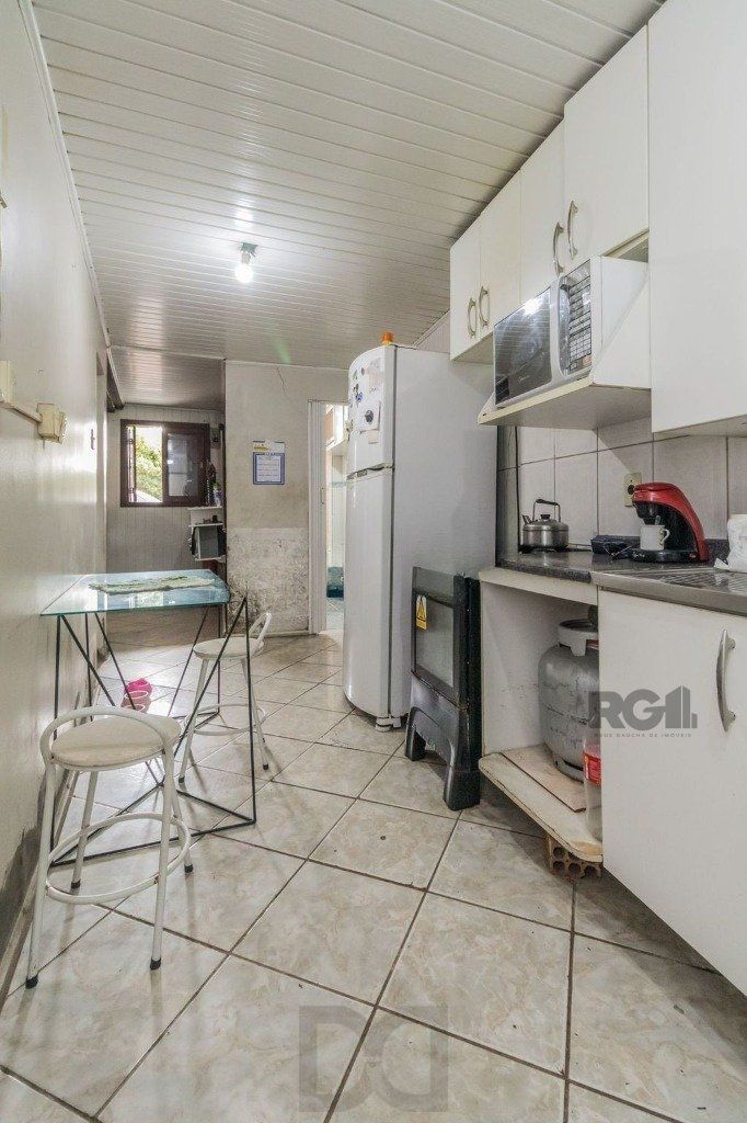 Casa de 4 dormitórios, no bairro Vila Jardim — foto 9
