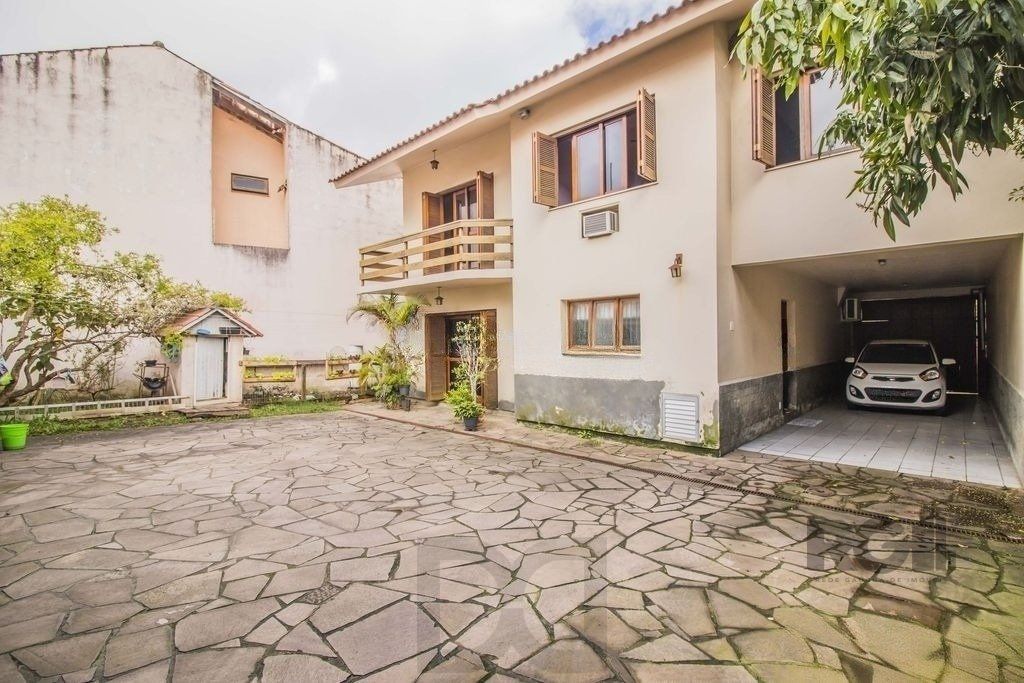 Casa de 329m² - 4 dormitórios, 1 suíte, 6 vagas no bairro Vila Jardim — foto 24