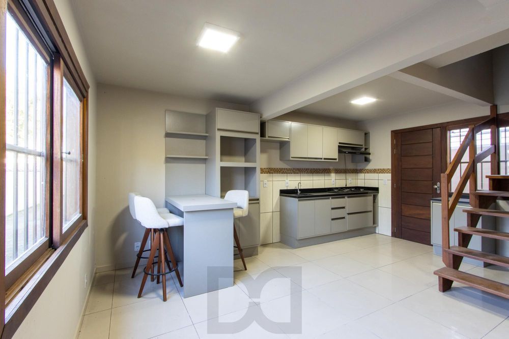 Casa de Condomínio 3 dormitórios no bairro Espirito Santo em Porto Alegre — foto 1