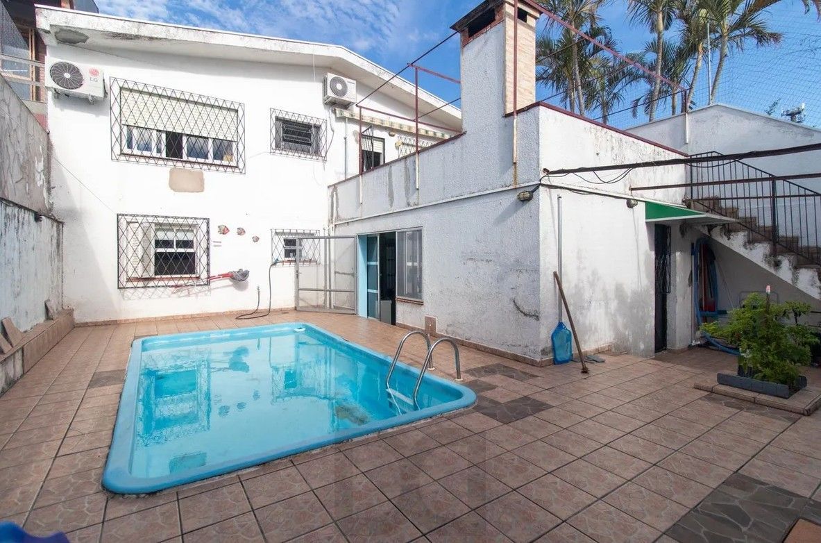 Casa com 4 dormitórios e energia solar no bairro Nonoai. — foto 34