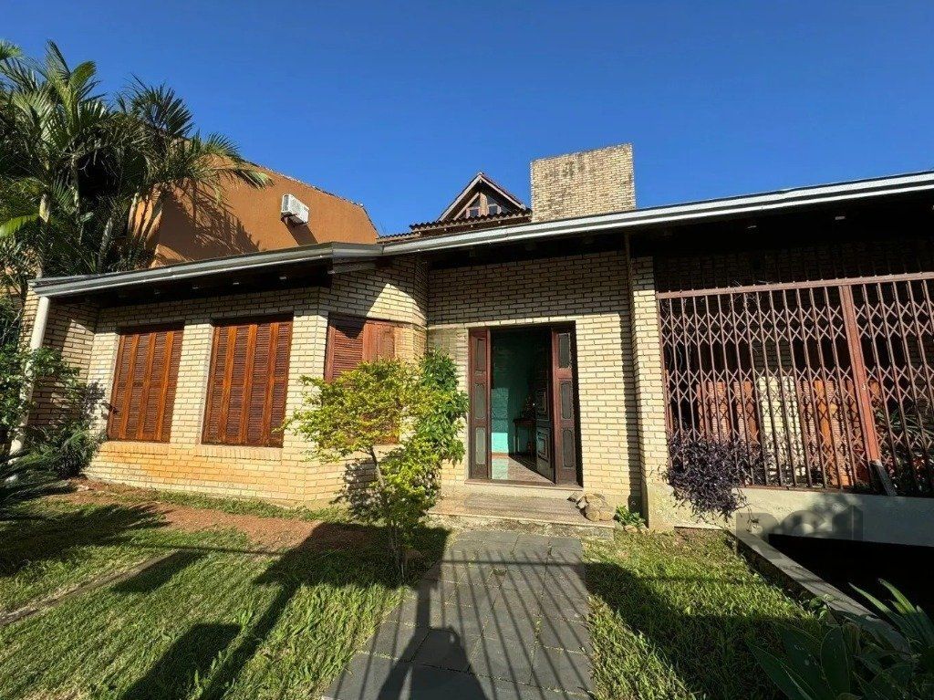 Casa com 4 dormitórios no bairro nonoai — foto 30
