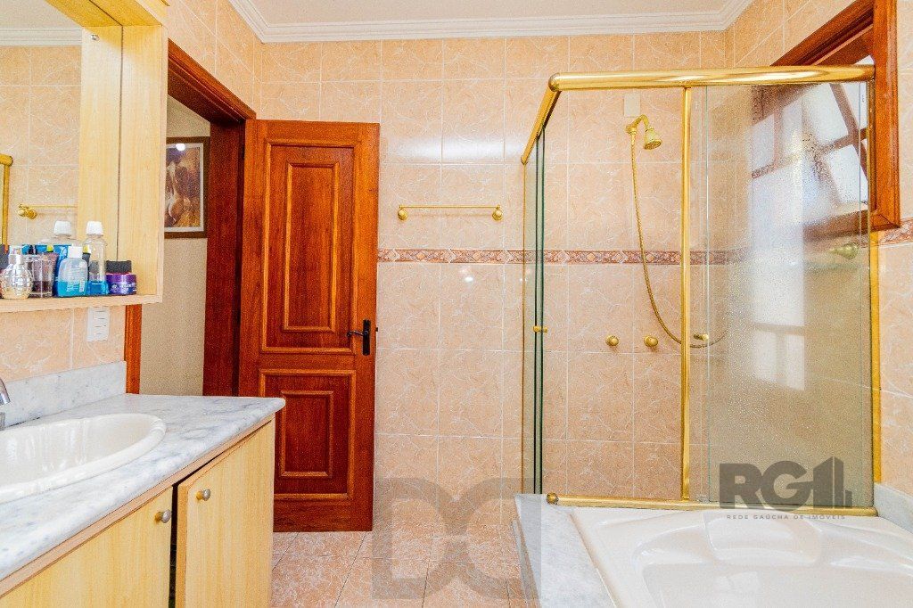 Casa de 4 dormitórios 304m² no bairro Jardim Lindóia — foto 31