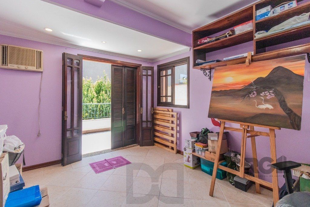 Linda casa de 04 dormitórios com vista livre no Bairro Teresópolis — foto 30