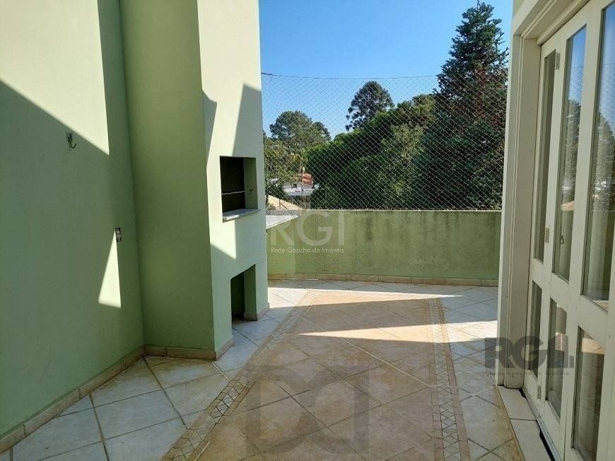 Casa com 03 dormitórios, 01 suíte, pátio, terraço com churrasqueira e vaga de garagem para 03 carros no bairro Ipanema — foto 16