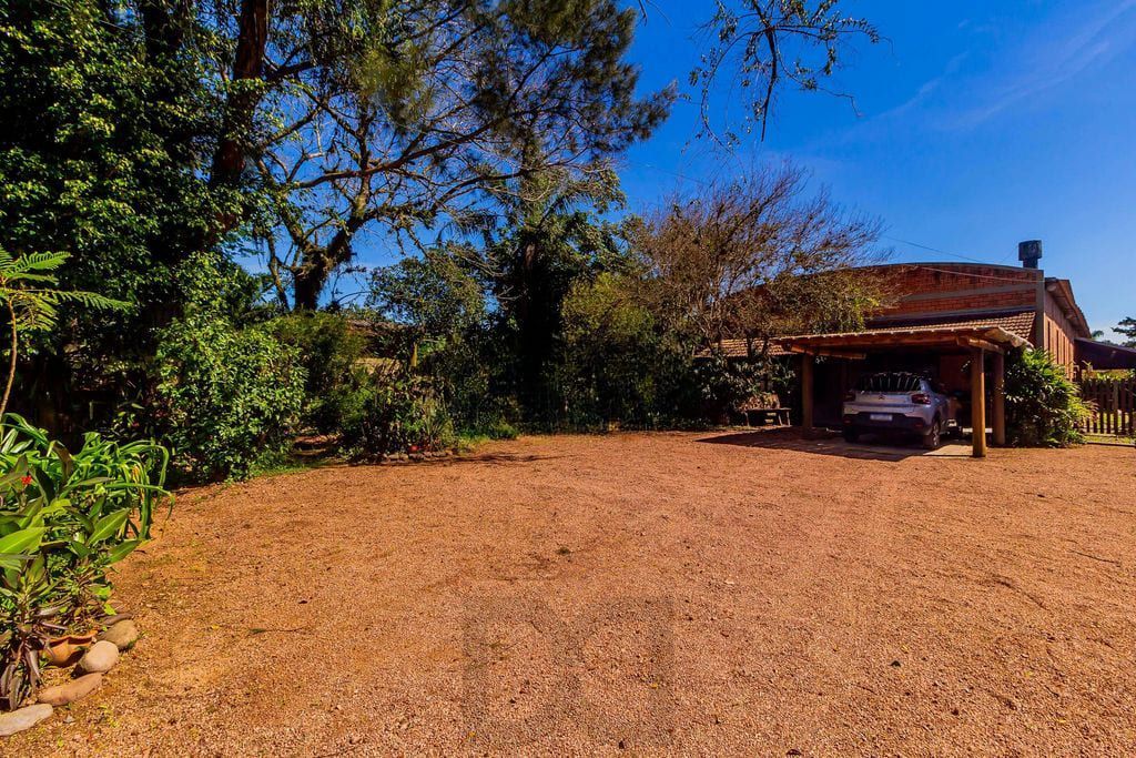 Casa de 3 dormitórios, no Bairro Ponta Grossa - Porto Alegre — foto 31