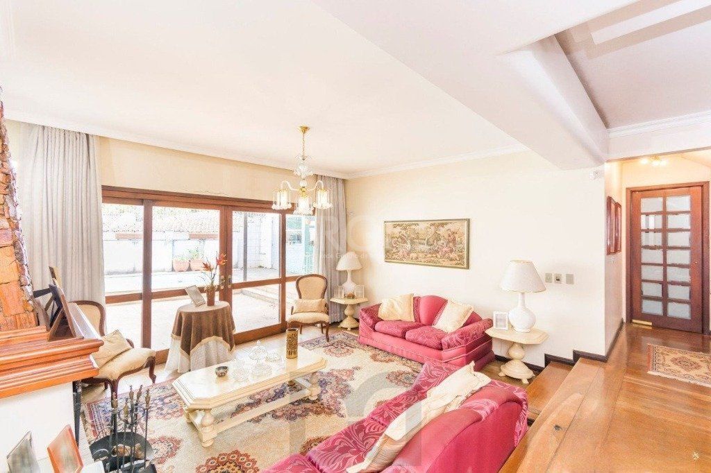 Casa de 333m² com 4 dormitórios, pátio com piscina, espaço gourmet com churrasqueira e 4 vaga de garagem no bairro Passo da Areia — foto 7