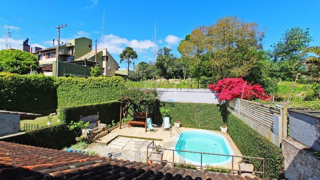 Sobrado 3 dormitórios, 1suíte, área gourmet com churrasqueira, piscina. — foto 36