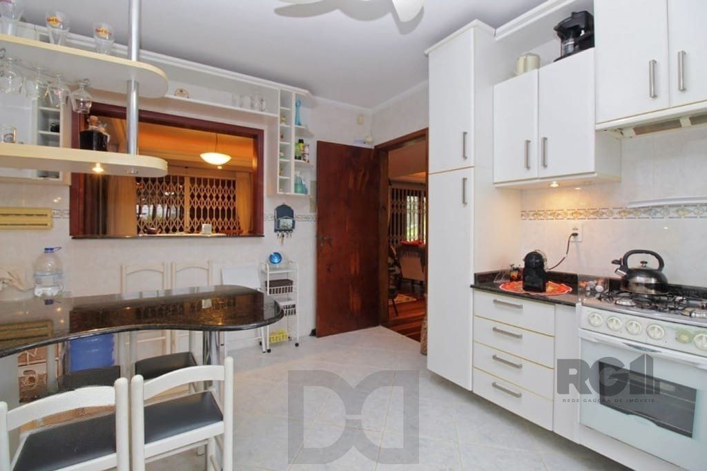 Casa de 275m² - 3 dormitórios e 3 vagas no bairro Coronel Aparício Borges — foto 26