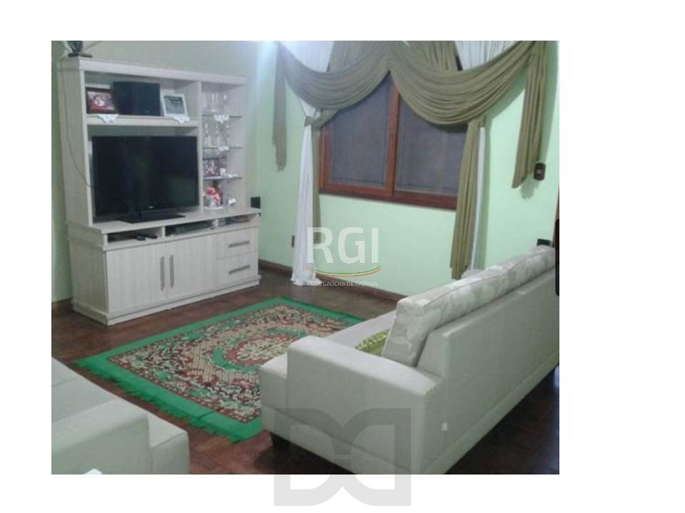 Casa para Venda - 634m², 2 dormitórios, sendo 1 suites, 3 vagas - Lomba do Pinheiro — foto 3