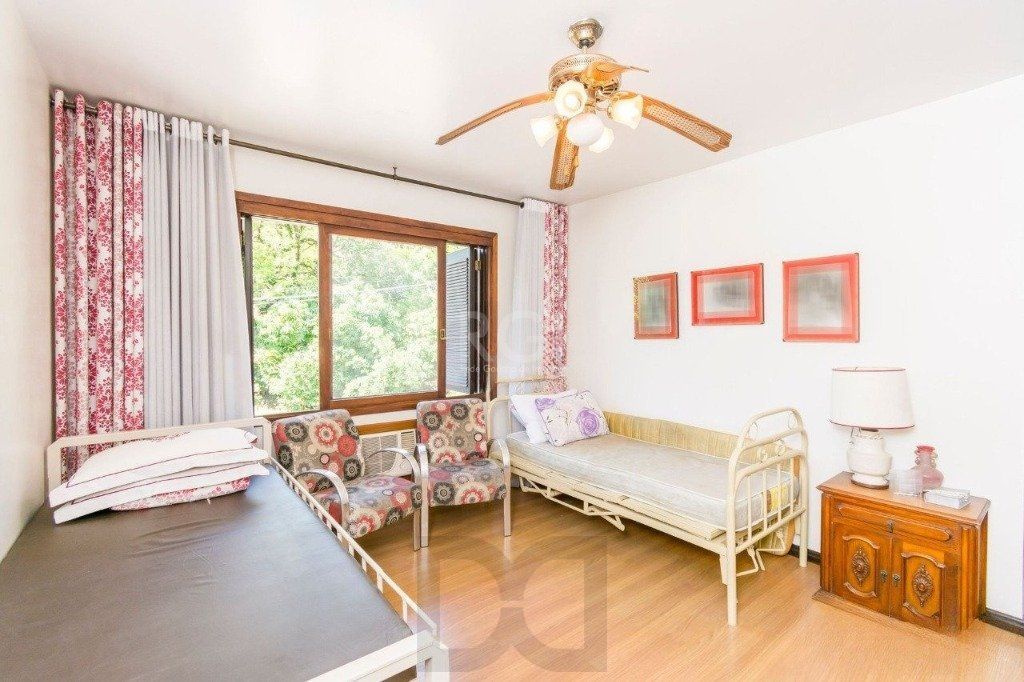 Casa de 333m² com 4 dormitórios, pátio com piscina, espaço gourmet com churrasqueira e 4 vaga de garagem no bairro Passo da Areia — foto 17