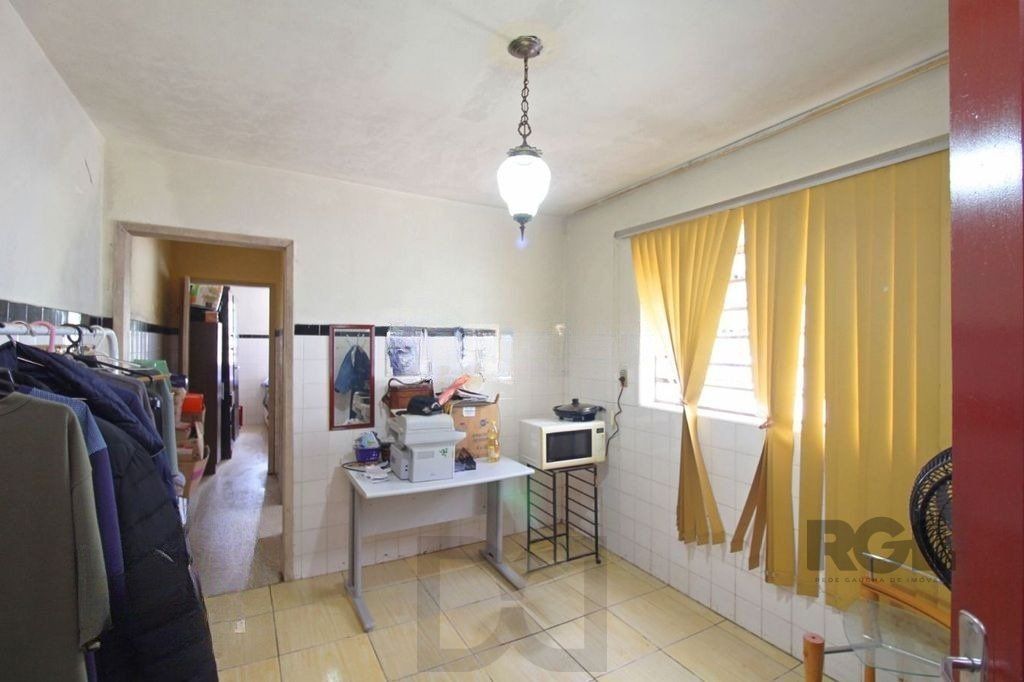 Casa 4 Dormitórios Bairro Teresópolis — foto 11