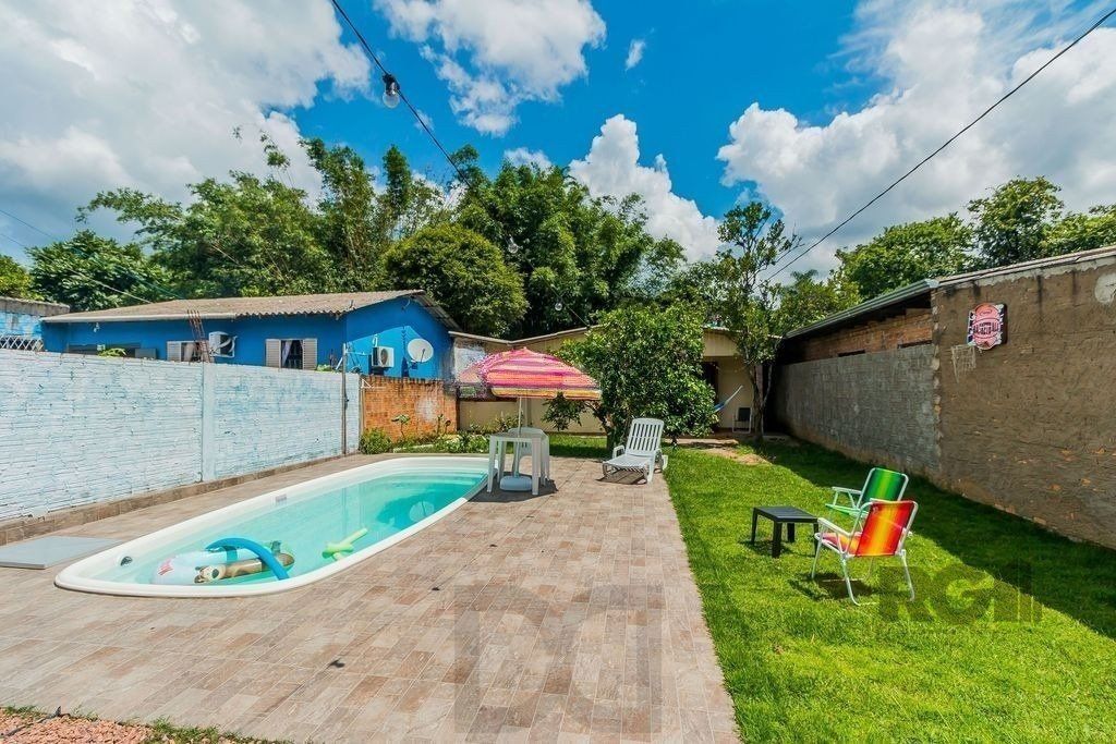 Casa de 2 dormitórios com 98m² no Bairro Lomba do Pinheiro — foto 5