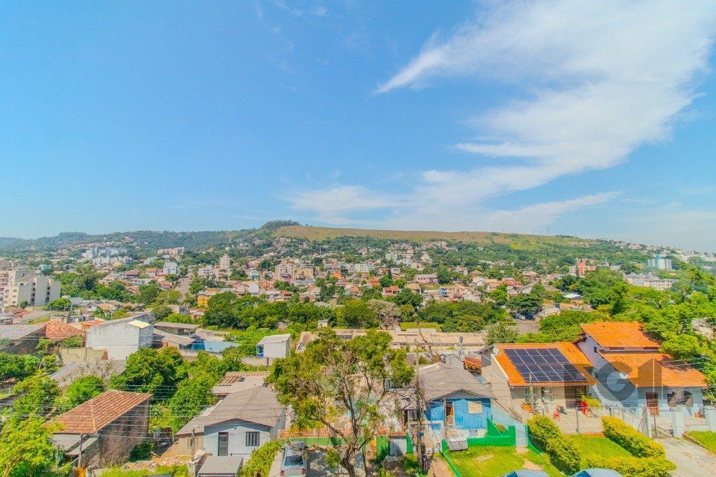 Linda casa de 04 dormitórios com vista livre no Bairro Teresópolis — foto 58