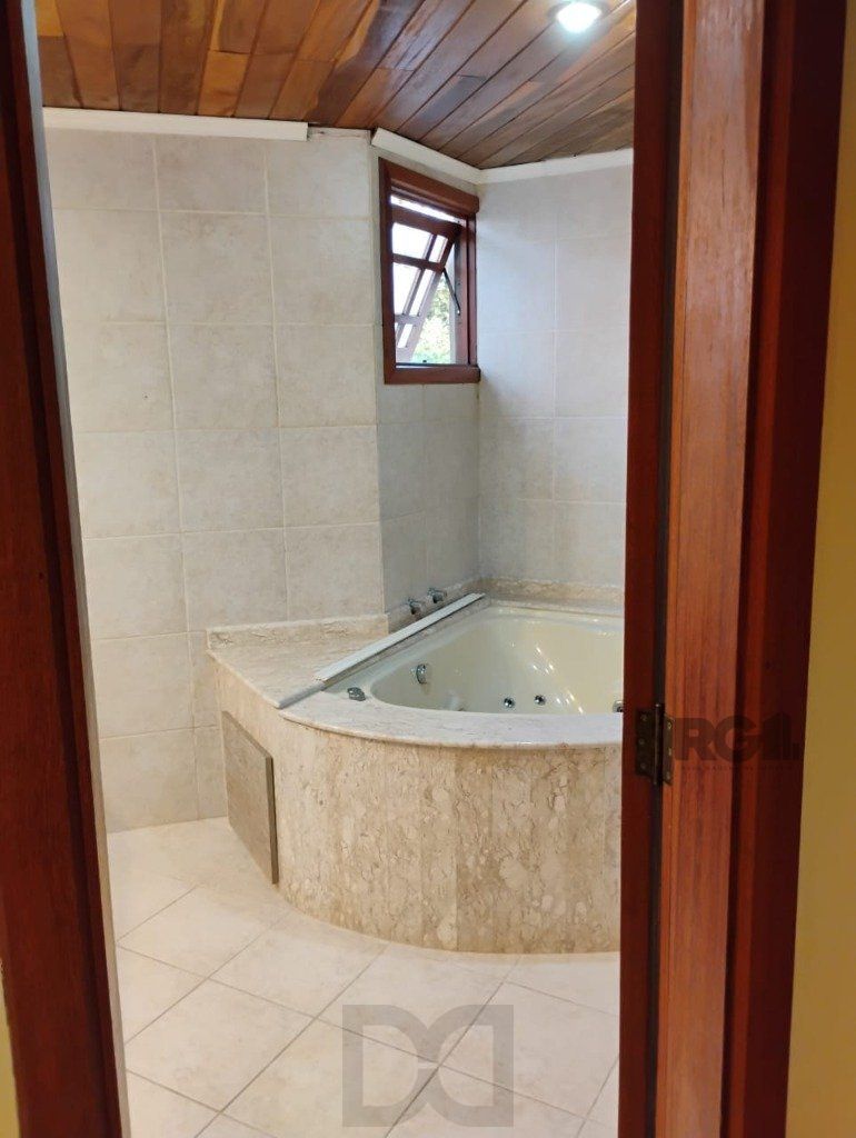 Casa em condomínio de 166m², 3 suítes 1 vaga do bairro Jardim Isabel — foto 14