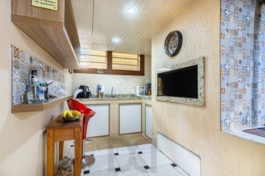Excelente casa de 264m² com 4 dormitórios no bairro Menino Deus — foto 10