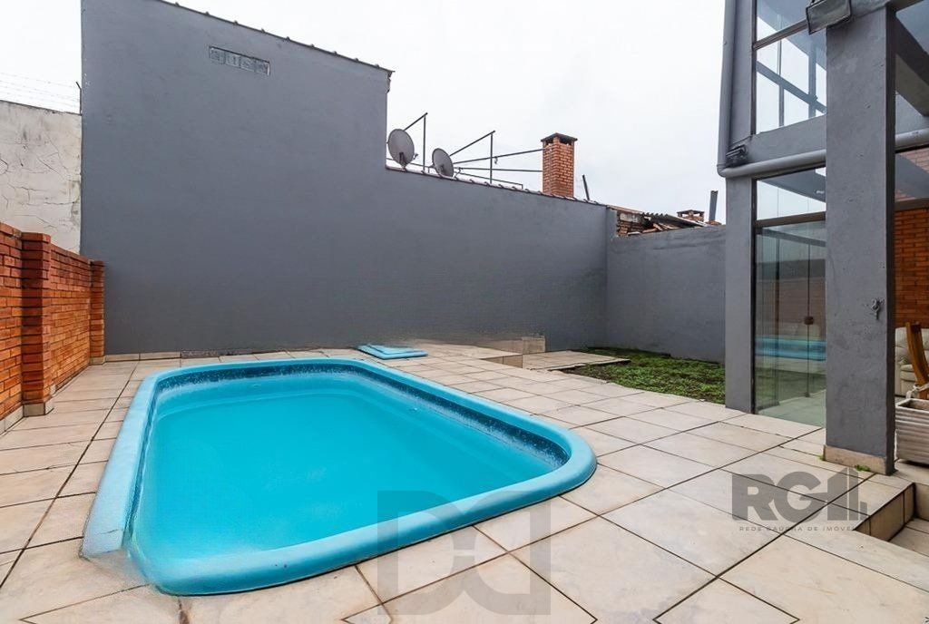Casa de 245m² com 5 dormitórios no bairro Sarandi — foto 28