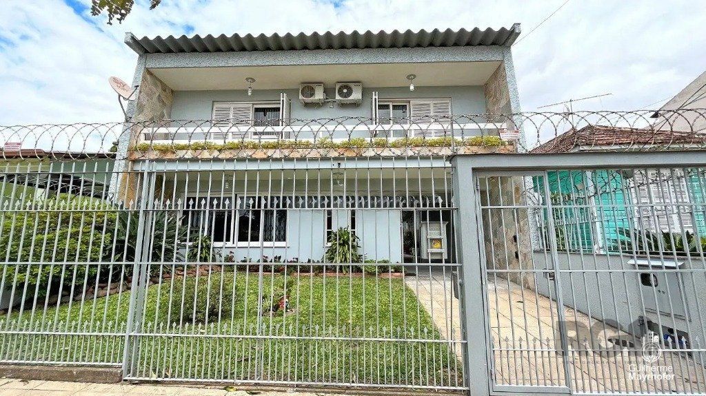 Casa com 3 dormitórios no bairro Jardim Itu, Porto Alegre — foto 3