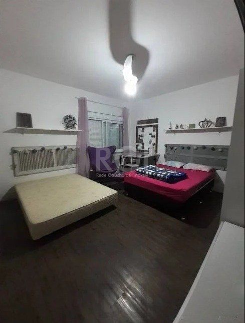 Casa com 233m², 2 dormitórios sendo 1 suíte, living com lareira, espaço gourmet com churrasqueira, pátio e 2 vagas de garagem no bairro Sarandi — foto 16