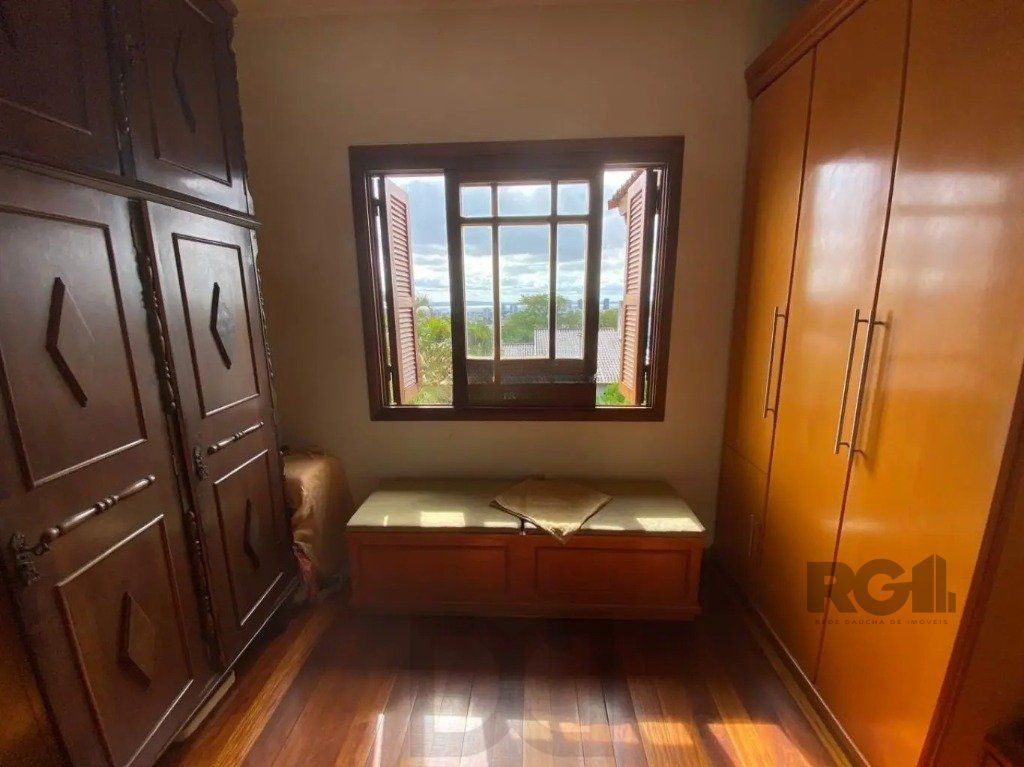 Casa com 4 dormitórios no bairro nonoai — foto 16