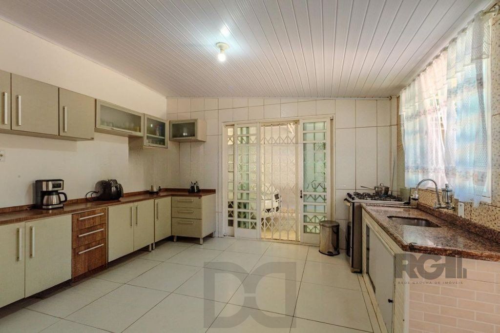 Casa de 3 dormitórios no bairro Rubem Berta — foto 10