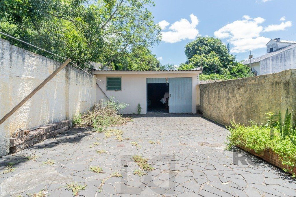 Casa com 4 dormitórios no bairro Gloria — foto 34