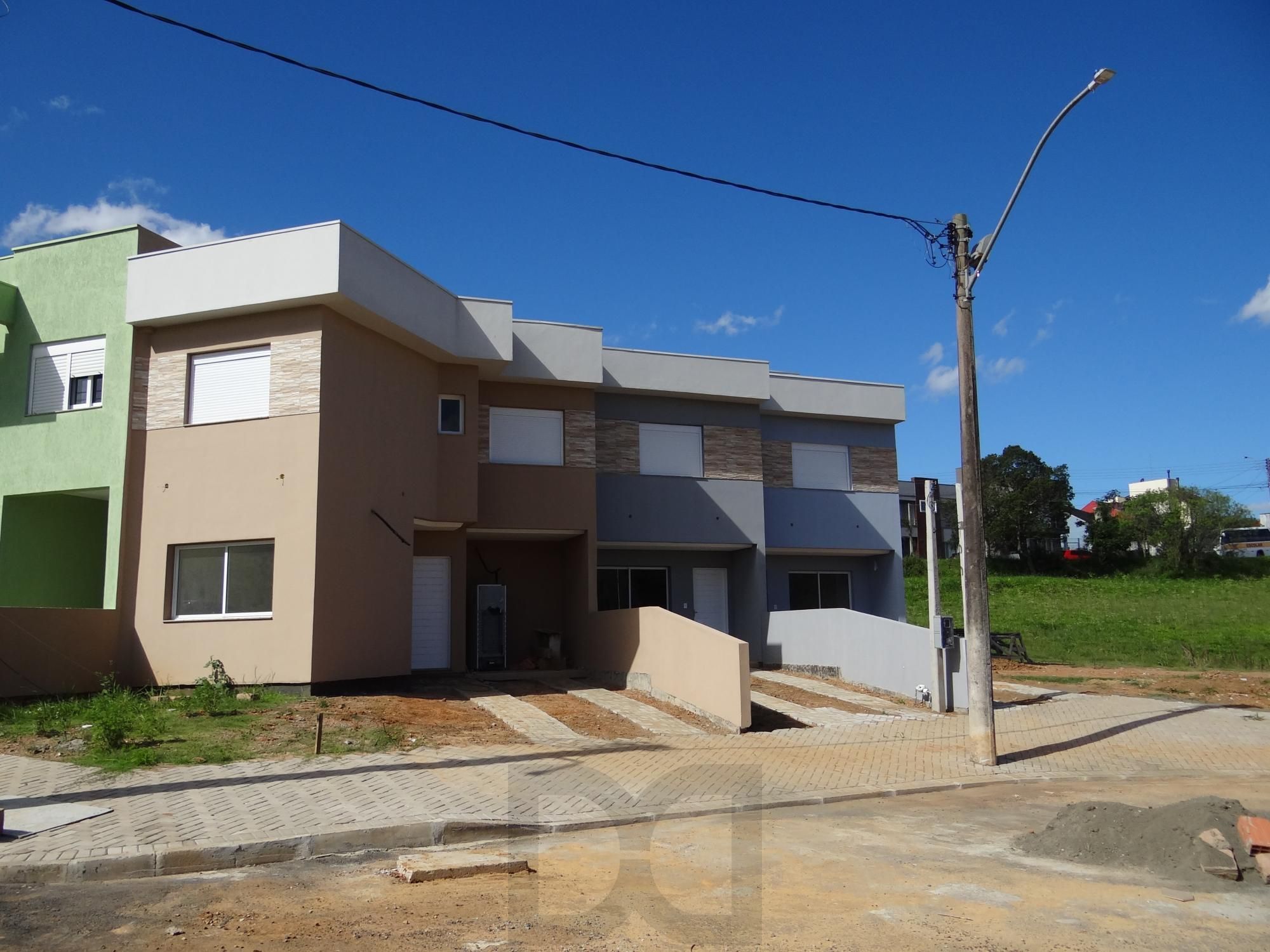 Casa com 3 dormitórios no bairro Mário Quintana — foto 2
