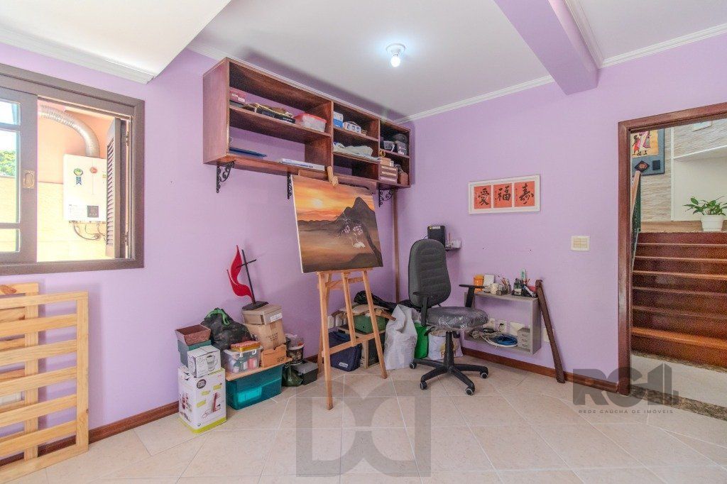 Linda casa de 04 dormitórios com vista livre no Bairro Teresópolis — foto 32