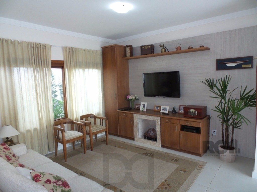 Excelente casa em condomínio com 3 dormitórios e 4 vagas. — foto 3