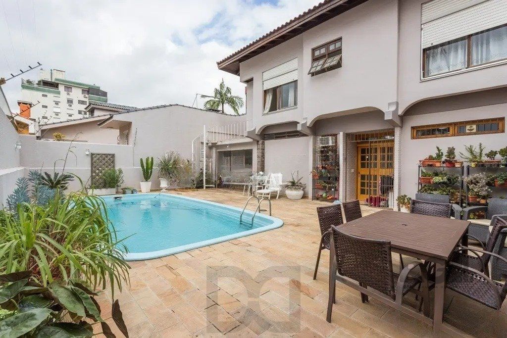 Casa com 3 dormitórios no bairro Jardim Lindóia — foto 4