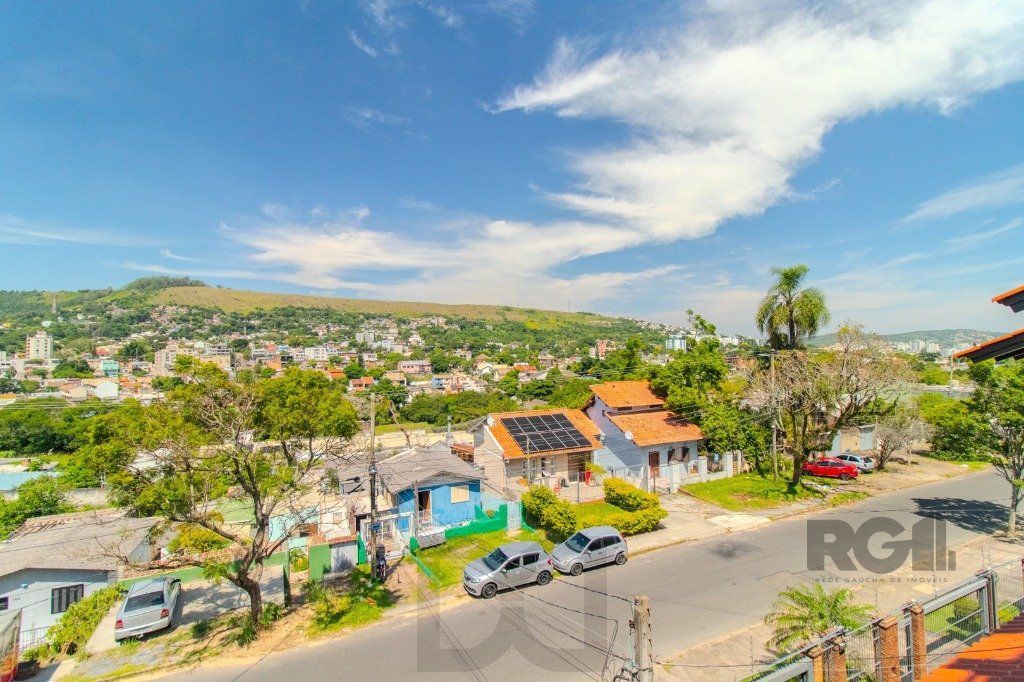 Linda casa de 04 dormitórios com vista livre no Bairro Teresópolis — foto 51
