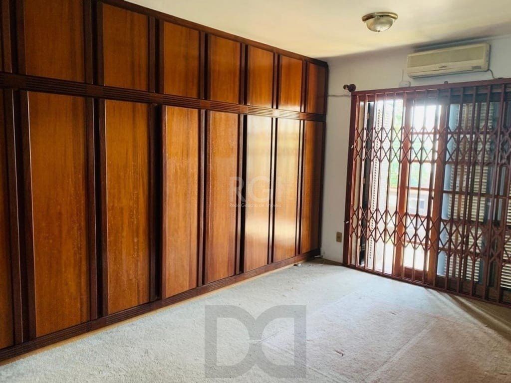 Encantadora residência com 03 dormitórios sendo 01 suíte e piscina. — foto 6