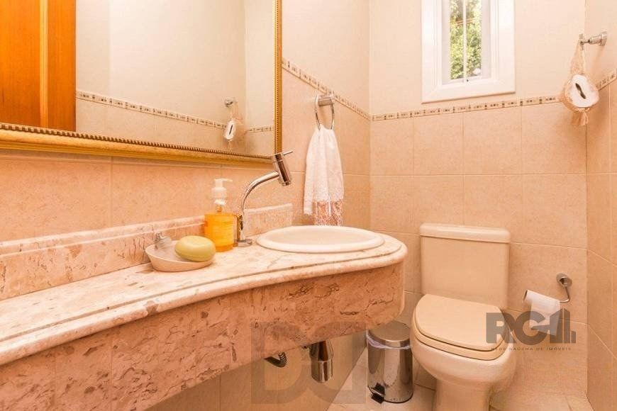 Casa de 380m² - 4 dormitórios, 2 suítes, 4 vagas no bairro Bom Jesus — foto 5