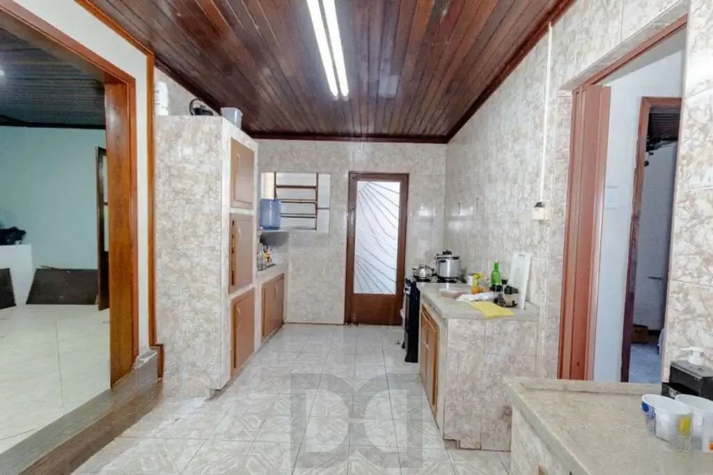 Casa à venda com 3 dormitórios, 1 suíte e espaço gourmet em terreno alto — foto 11