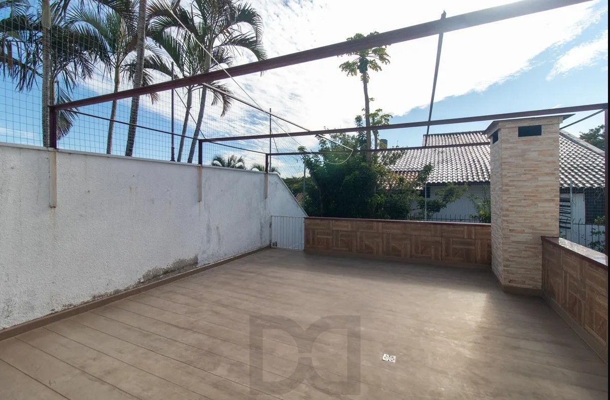 Casa com 4 dormitórios e energia solar no bairro Nonoai. — foto 36
