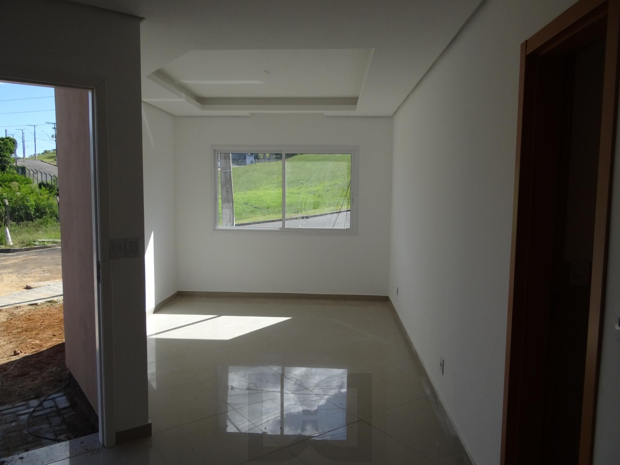 Casa com 3 dormitórios no bairro Mário Quintana — foto 3